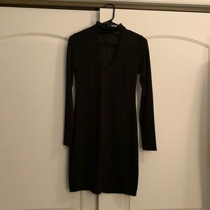 Black open triangle dress